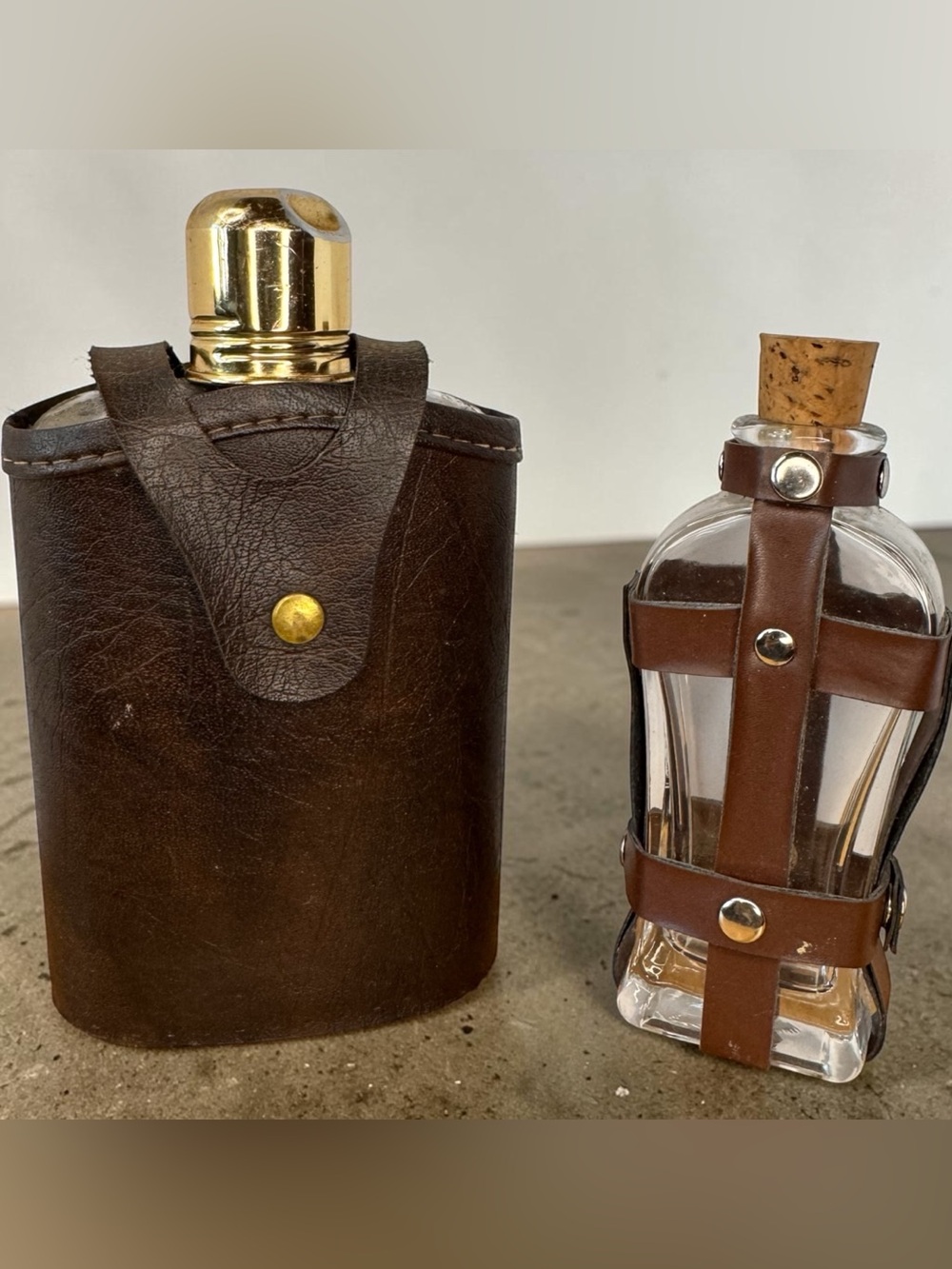 Pair of Vintage Glass Hip Flasks with Leather Harnesses